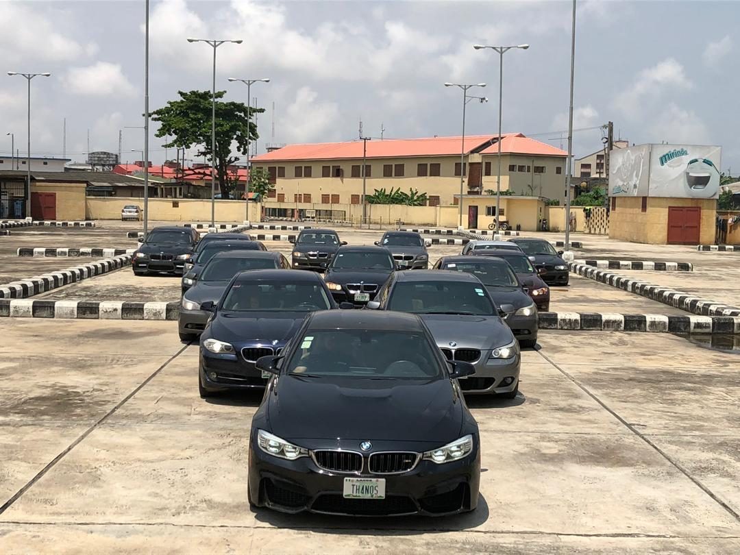 A line of BMWs staged for a club drive